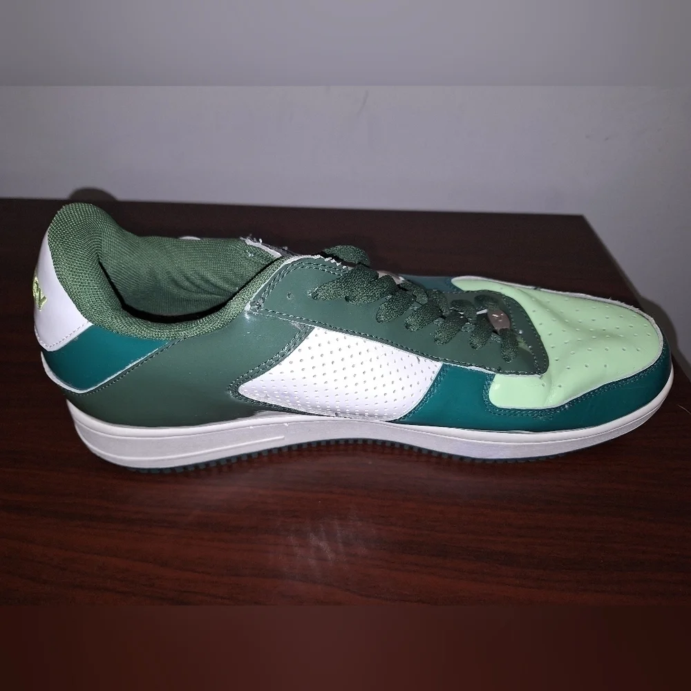 A pair of Starbury men's size 14 green sneakers. They're in excellent condition